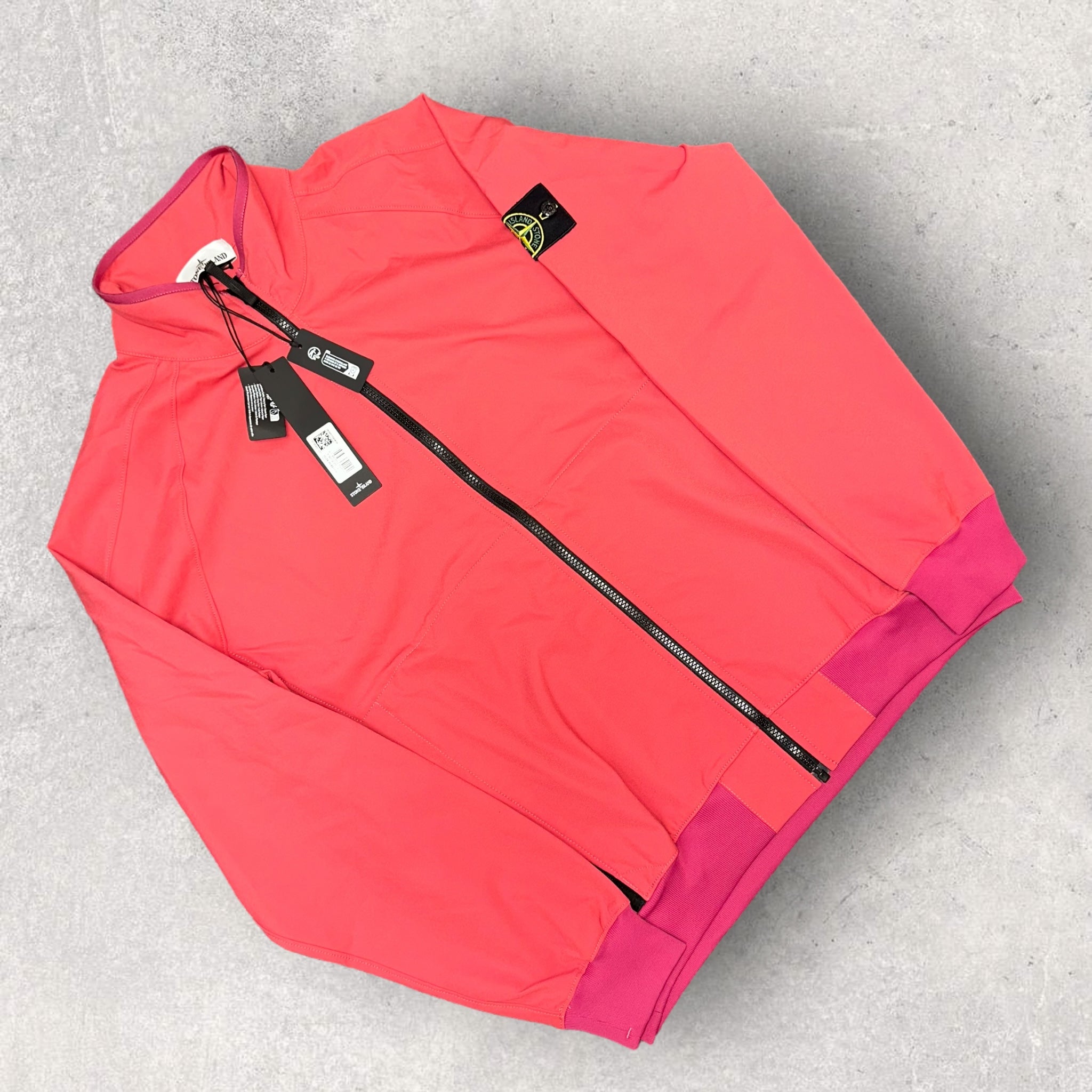 Pink stone island bomber best sale